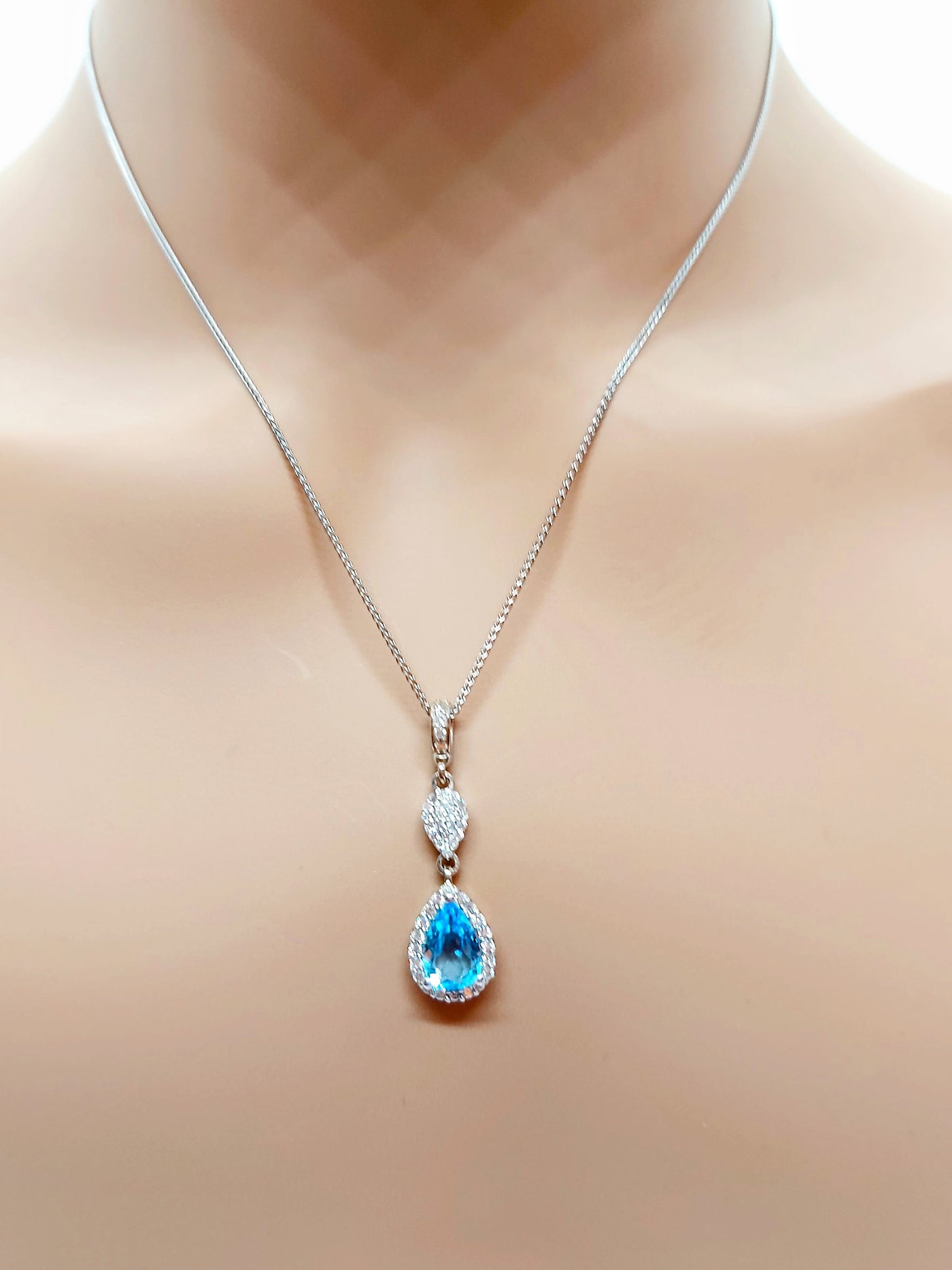 14k Pear Blue Topaz Necklace with diamonds