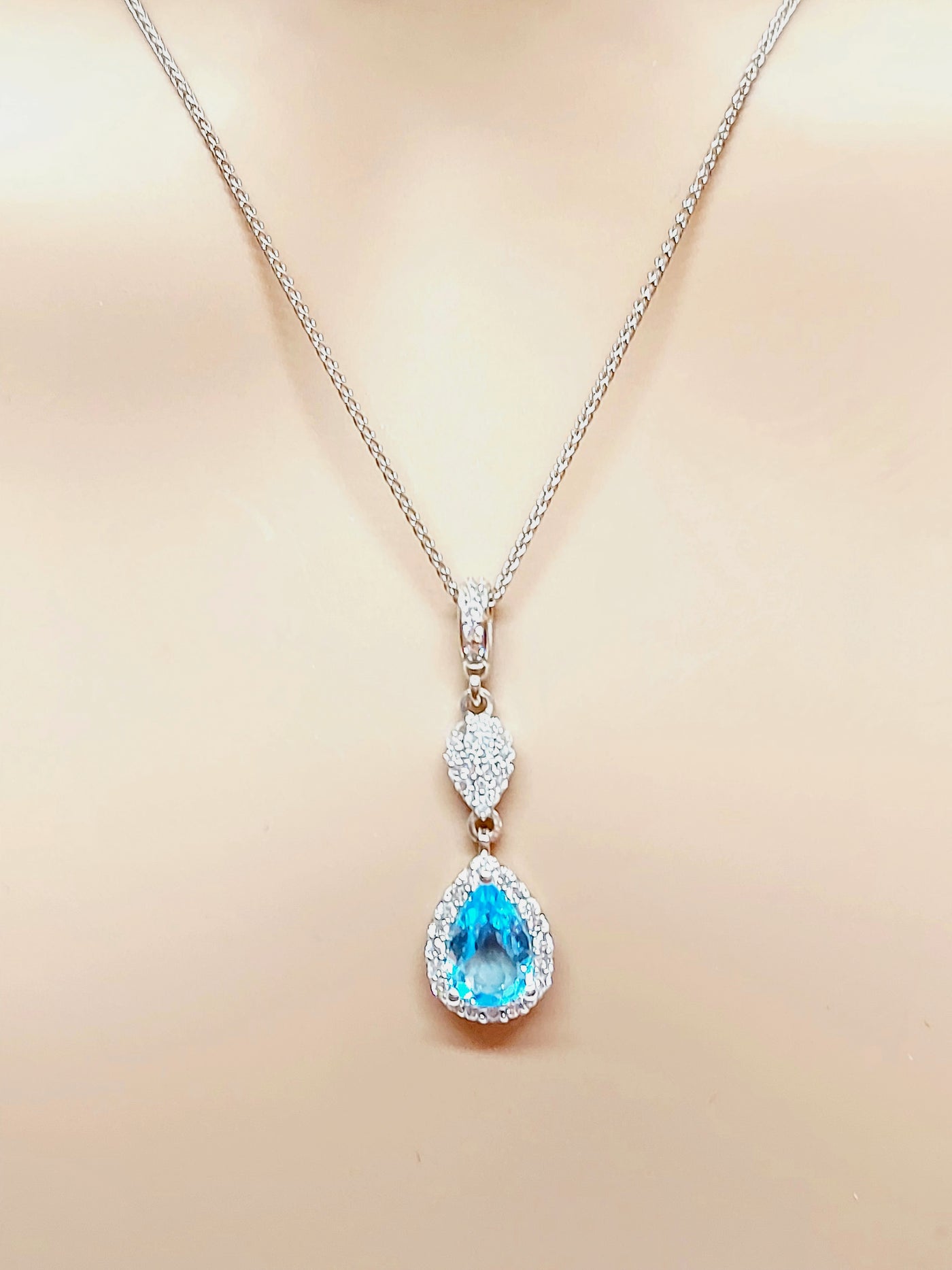 14k Pear Blue Topaz Necklace with diamonds