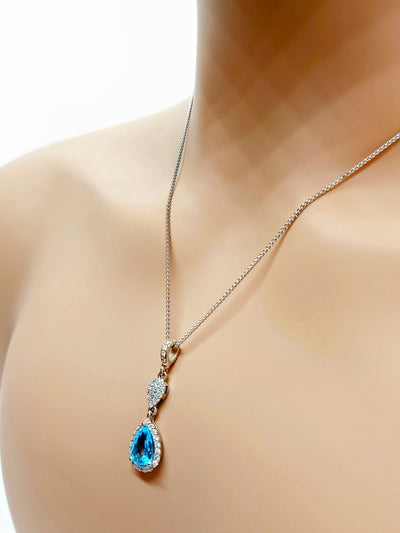 14k Pear Blue Topaz Necklace with diamonds