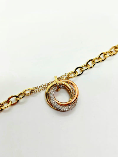 10k Gold Bracelet with 3 tone round pendants