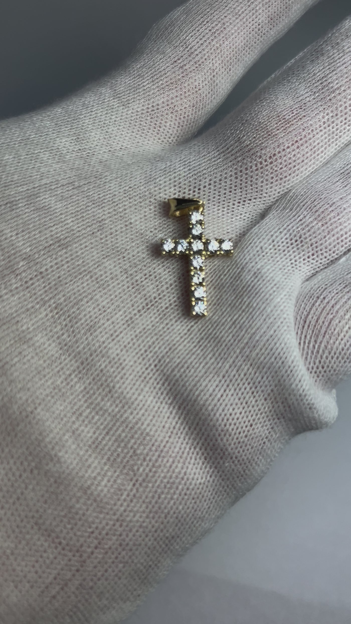 10k Cross pendant with CZ stones