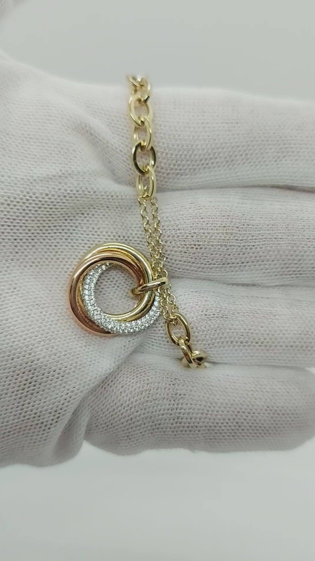 10k Gold Bracelet with 3 tone round pendants