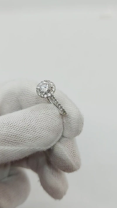 14k White Gold, 0.95ct center diamond Round cut, sides 0.50ct diamonds.