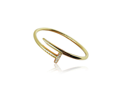 Front-facing titled 18k gold bangle bracelet