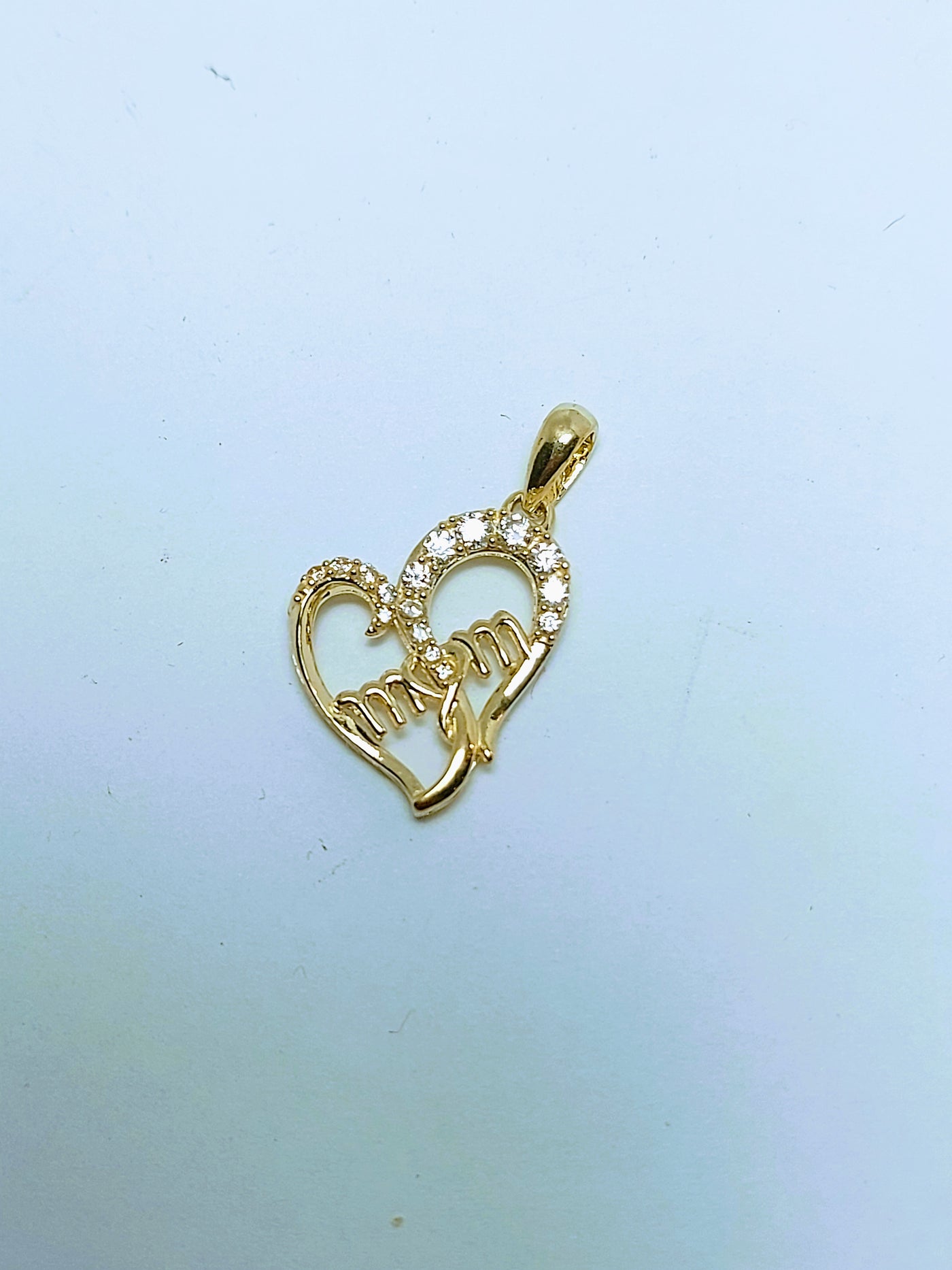 Heart gold pendant with mom inside