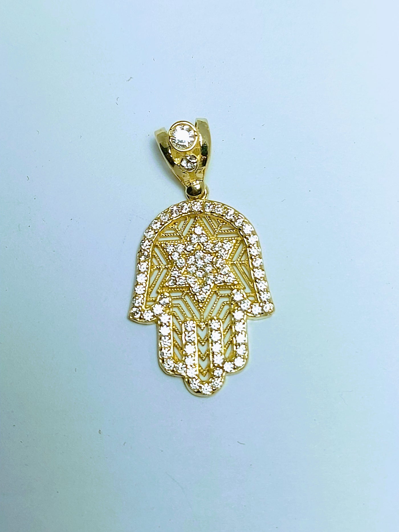 Hamsa pendant with star of David