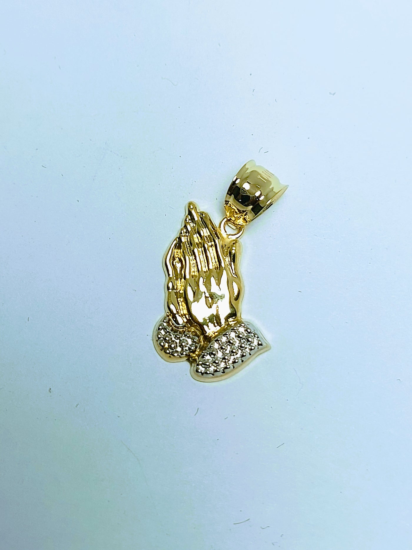 Praying hand pendant