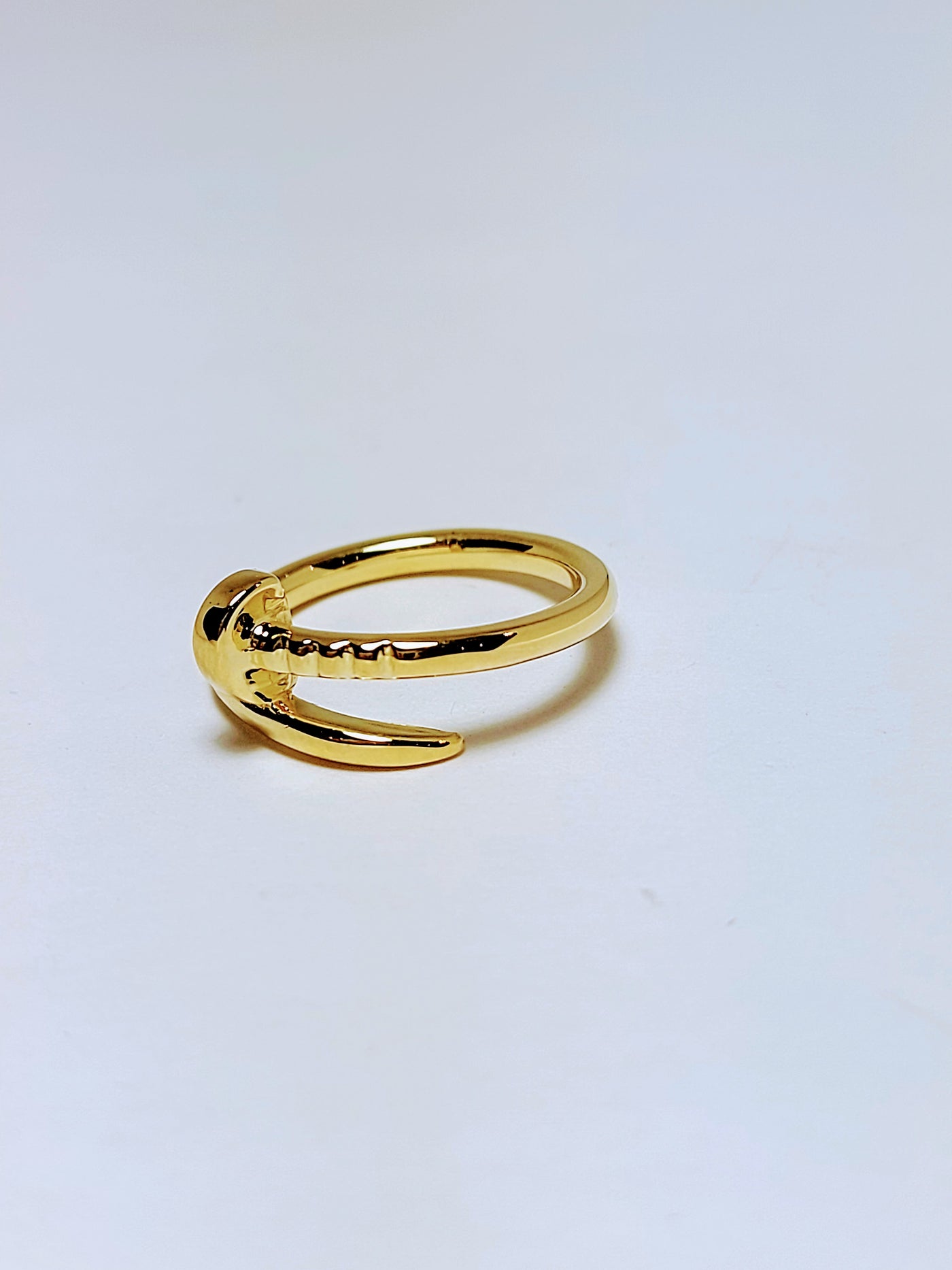 Solid gold clou ring