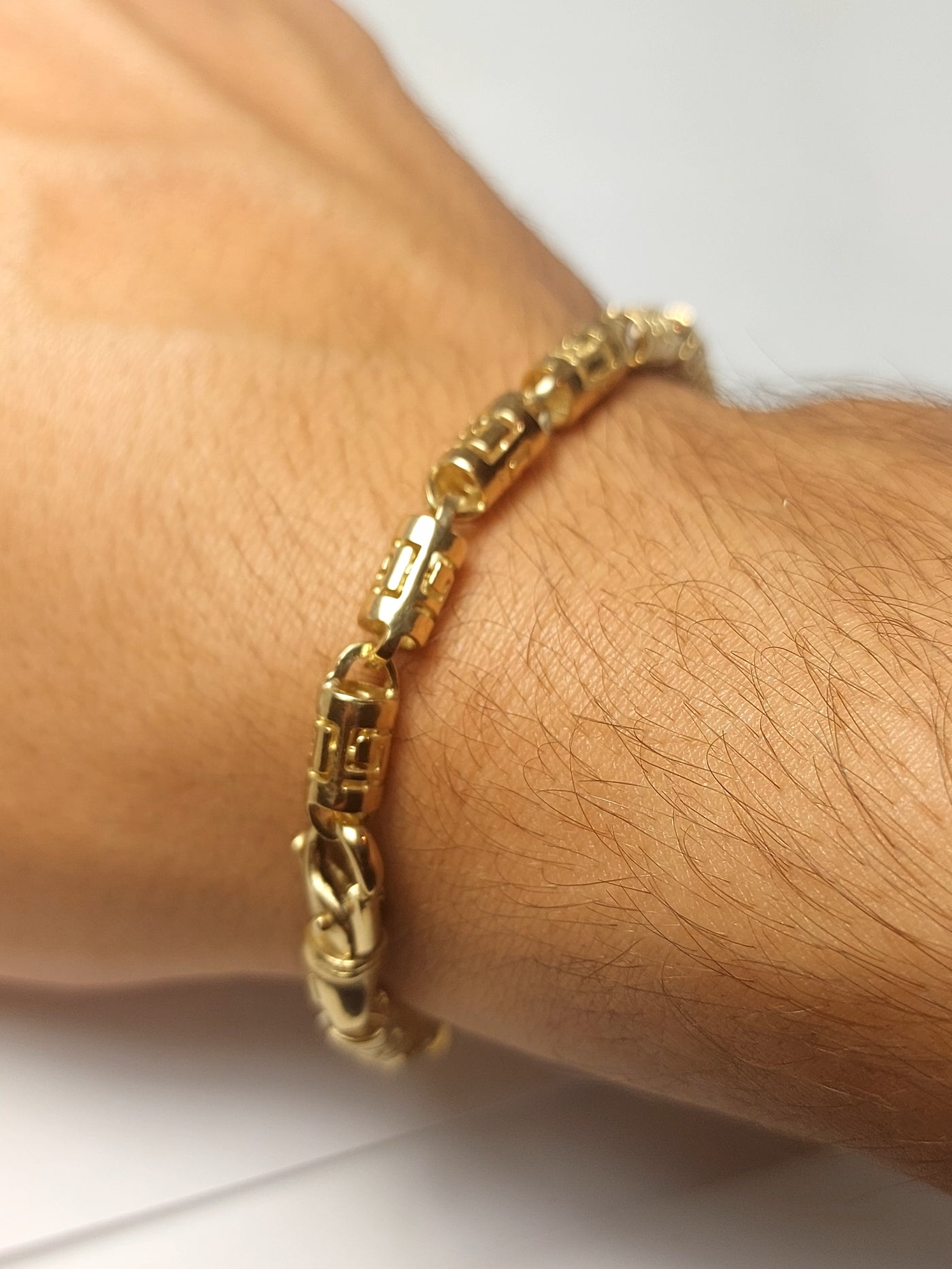 Men's gold bracelet with Greek design