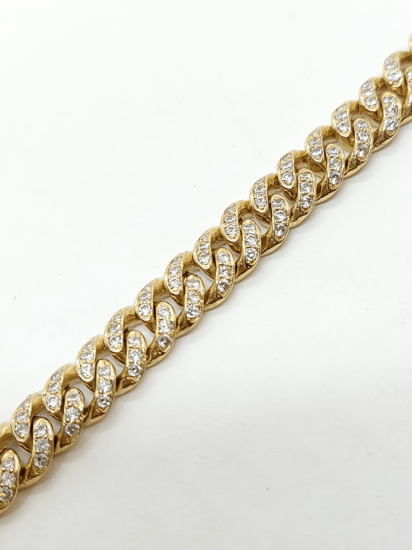 Solid gold tight Cuban bracelet with CZ 60$/gram