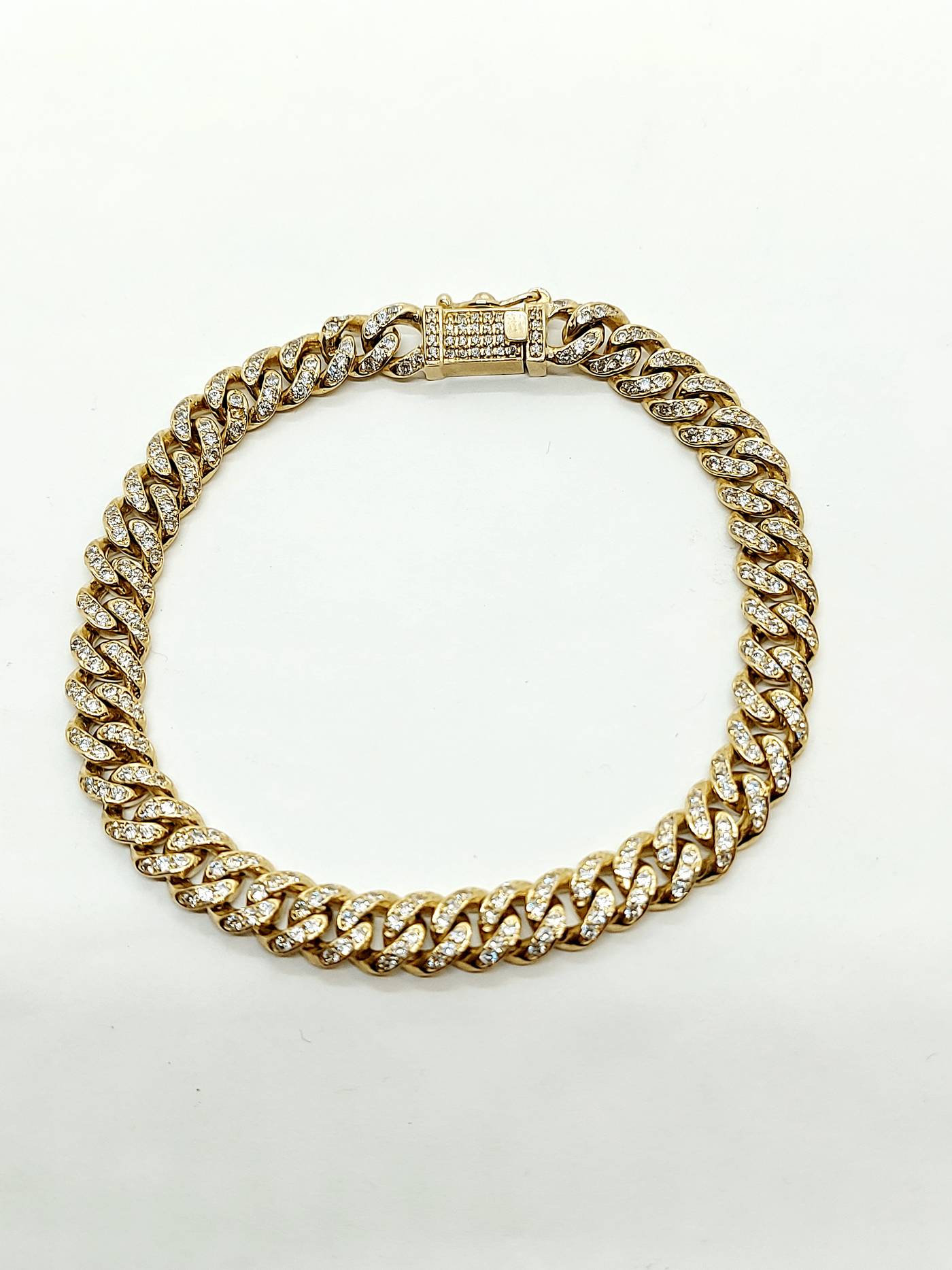 Solid gold tight Cuban bracelet with CZ 60$/gram