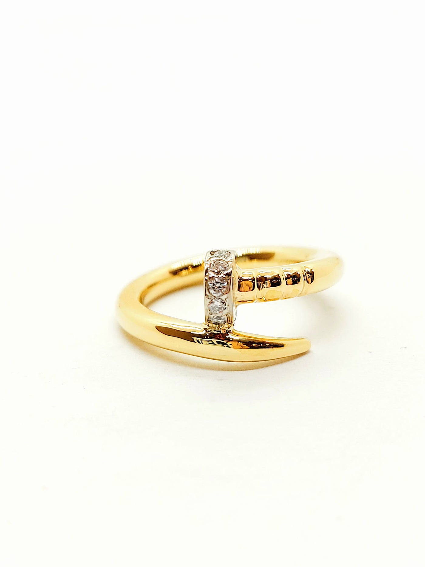 Solid gold clou ring with diamond