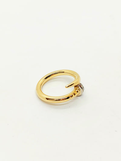 Solid gold clou ring with diamond